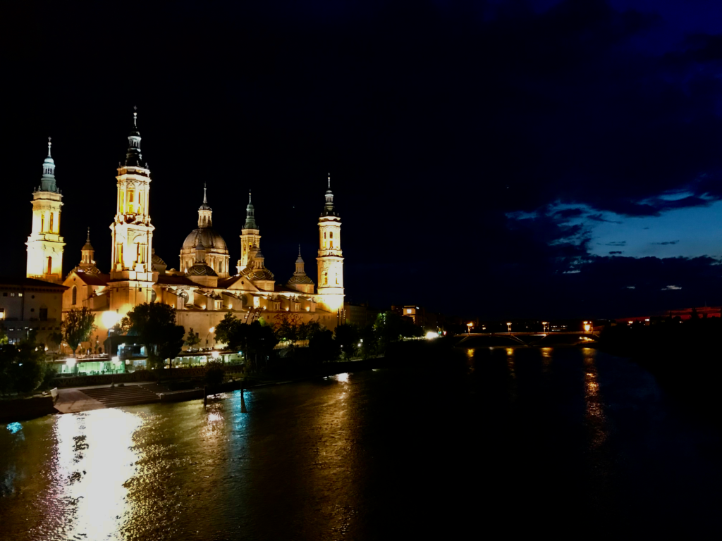 Cathedral in Saragossa lit up at night. 