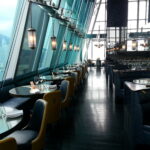 Floor-to-ceiling windows frame an uninterrupted view of Hong Kong Island’s glittering skyscrapers, making it a perfect spot to watch the nightly Symphony of Lights show. Aqua restaurant is one of Hong Kong’s most iconic dining destinations, offering a luxurious experience with some of the best panoramic views of the Victoria Harbour skyline.