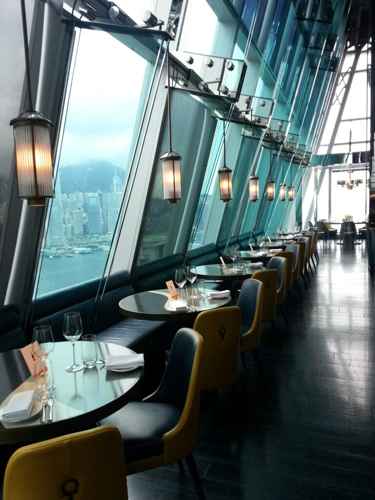 Floor-to-ceiling windows frame an uninterrupted view of Hong Kong Island’s glittering skyscrapers, making it a perfect spot to watch the nightly Symphony of Lights show. Aqua restaurant is one of Hong Kong’s most iconic dining destinations, offering a luxurious experience with some of the best panoramic views of the Victoria Harbour skyline.